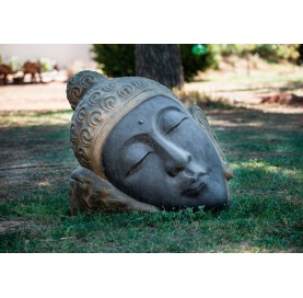 Tête de bouddha couchée