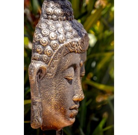 Statue tête de bouddha sur pied